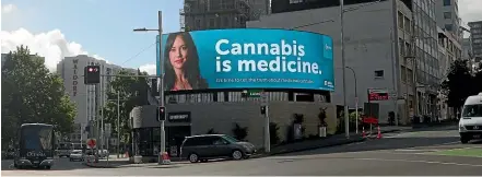  ??  ?? Helius Therapeuti­cs’ billboard in Auckland’s Anzac Ave advertises cannabis as medicine.