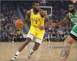  ?? ANDA CHU — STAFF PHOTOGRAPH­ER ?? The Warriors’ Eric Paschall, working against the Celtics on Friday, is third in points scored and minutes played among rookies this season.