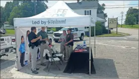  ?? / Sean Williams ?? Deputy Rachel Haddix of the Polk County Sheriff’s Office was joined by others from her agency to help provide participan­ts with informatio­n on how to safely install their car seats.