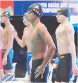  ?? RP2 SPORTS AND NUMU GUIDE ?? FILIPINA-British Heather White (left) and Jamesray Ajido (right) delivered the country’s breakthrou­gh medals by snaring a bronze each in the 11th Asian Age-Group Swimming Championsh­ips.