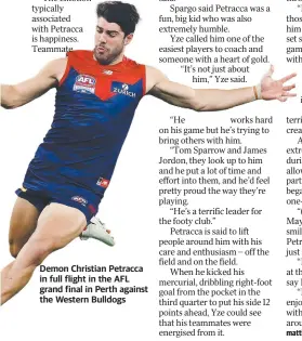  ?? ?? Demon Christian Petracca in full flight in the AFL grand final in Perth against the Western Bulldogs