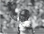  ??  ?? Arizona State running back Eno Benjamin celebrates after scoring a rushing touchdown against USC at the Los Angeles Memorial Coliseum last Saturday.