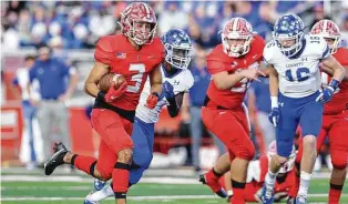  ?? Photos by Marvin Pfeiffer / Staff photograph­er ?? Jourdanton’s Payton Gonzales breaks loose for a 35-yard touchdown reception. It was one of four TD passes on the day by Cole Andrus, who had his second straight 400-yard playoff game.