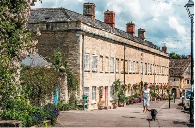  ??  ?? A terrace of 19th century tontine buildings at the bottom of Cecily Hill. A tontine was an arrangemen­t over the joint ownership of a house.