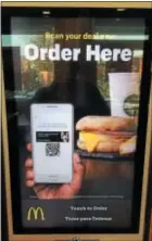  ??  ?? This kiosk in a Trenton-based McDonald’s ushers in new-wave dining experience for fast food patrons.