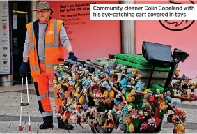  ?? ?? Community cleaner Colin Copeland with his eye-catching cart covered in toys