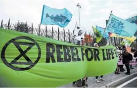  ?? GABRIEL BOUYS/GETTY-AFP ?? A protest is expected to attract “at least 100,000” Friday at UN climate talks in Madrid.