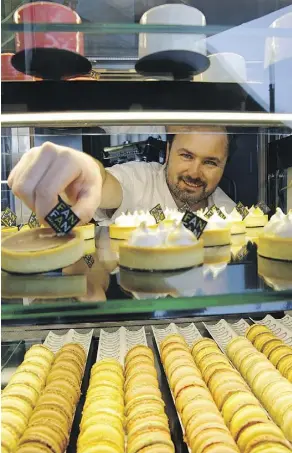 ?? LARRY WONG ?? FanFan Patisserie owner/chef Franck Bouilhol provides customers with French pastries, gelato and coffee at his Old Strathcona shop.