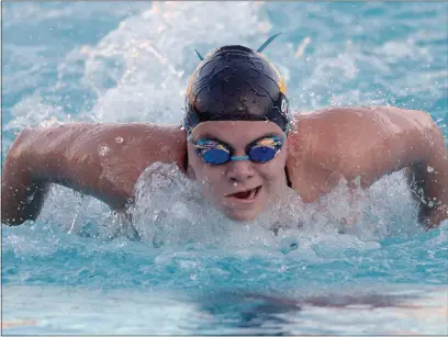  ?? PHOTOS BY SHERRY LAVARS — MARIN INDEPENDEN­T JOURNAL ?? Kate O’Leary of Novato swims the fly during its non-league meet against Terra Linda at Novato High in Novato on Friday.