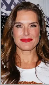  ?? ?? BROOKE SHIELDS, 56: This is old-style movie star glamour with a twist. Tucking her hair back provides clean lines around her neck and jawline