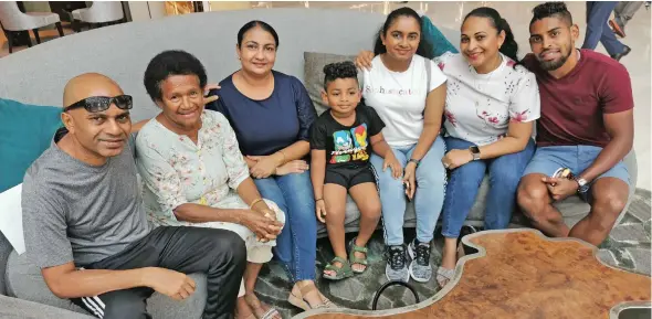  ??  ?? Roy Krishna(right) and his wife Naziah Ali(sixth from left) with family members.