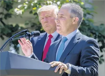  ?? Shawn Thew European Pressphoto Agency ?? EPA ADMINISTRA­TOR Scott Pruitt delivers remarks after President Trump announced the U.S. was withdrawin­g from the Paris climate accord during a Rose Garden event at the White House on June 1.