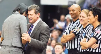  ?? Jason Hirschfeld / Associated Press ?? UConn coach Geno Auriemma and longtime UConn assistant and current Temple coach Tonya Cardoza, left, meet before tipoff of a 2010 game in Norfolk, Va.