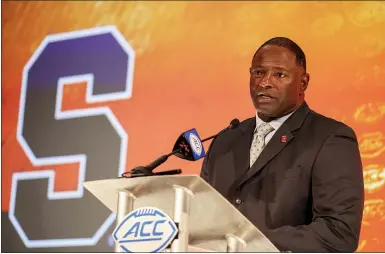  ?? NELL REDMOND — THE ASSOCIATED PRESS ?? Syracuse head coach Dino Babers answers a question during an NCAA college football news conference at the Atlantic Coast Conference media days in Charlotte, N.C., Thursday, July 22, 2021.