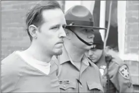  ?? AP/RICH SCHULTZ ?? Eric Frein is escorted by police out of the Pike County Courthouse on Oct. 31, 2014, after his arraignmen­t in Milford, Pa.