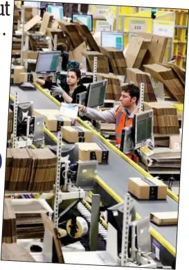  ??  ?? Gargantuan: This Amazon warehouse in Rugby employs hundreds