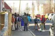  ?? DIGITAL FIRST MEDIA FILE PHOTO ?? A clump of Pottstown Middle School students along Oak Street on their way home from school Monday.