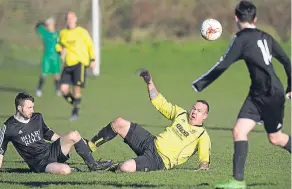  ??  ?? Fife Thistle (yellow) were down and out as Boars Rock registered a 7-2 success against them at Drumgeith.