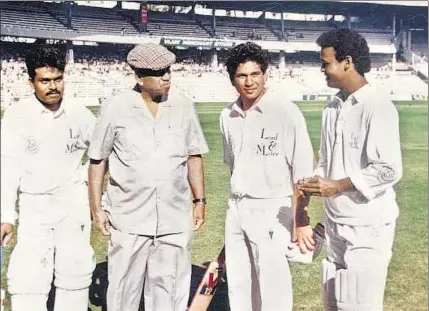  ?? HT ?? Pravin Amre, coach Ramakant Achrekar, Sachin Tendulkar, and Vinod Kambli at Wankhede Stadium, Mumbai, in the early 1990s. Aravind Adiga’s Selection Day issetin Mumbai’s cricketing circuit