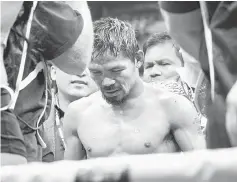  ??  ?? Manny Pacquiao reacts to fans following his defeat to Jeff Horn. — AFP photo