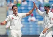  ?? REUTERS ?? Steve O’Keefe and Nathan Lyon shared 17 wickets in Pune.