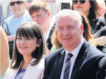  ??  ?? Disagreeme­nt Clare Haughey and James Kelly, seen at Landemer Day, have locked horns over education