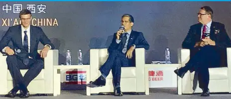  ??  ?? SBP president Al Panlilio (center) speaks at the FIBA World Basketball Summit in Xi’an, China, on stage with (left) Russian federation president Andrei Kirilenko and Finnish federation president Antti Zitting.