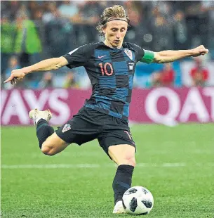  ?? JOHANNES EISELE/AFP/GETTY IMAGES ?? Luka Modric and his Nike Mercurial Vapor boots have been feathering passes and unleashing ferocious strikes throughout this World Cup, with Denmark up next on Sunday.