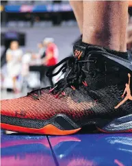  ?? JESSE D. GARRABRANT / NBAE VIA GETTY IMAGES ?? Nike has become more promotiona­l as a growing number of its footwear platforms slow, analysts say.