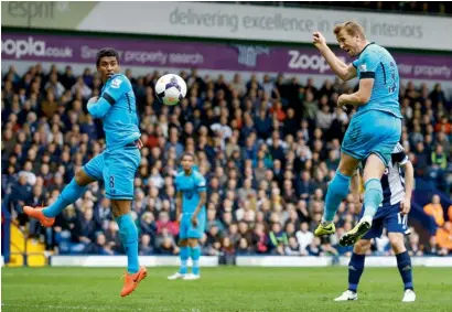  ??  ?? Tottenham Hotspur’s Harry Kane scores against West Bromwich Albion. —