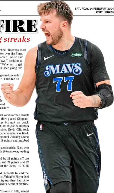  ?? GLENN JAMES/AGENCE FRANCE-PRESSE ?? LUKA Doncic dazzles his way to a 41-point performanc­e to lead the Dallas Mavericks to a 123-113 victory over the Phoenix Suns in the resumption of the NBA regular season.