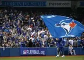  ?? RICHARD LAUTENS/TORONTO STAR FILE PHOTO ?? Depending on the game and your seat, Blue Jays tickets can cost as little as $13 before tax.