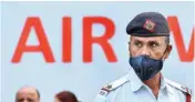  ?? PIC/PTI ?? A traffic policeman wears mask to protect himself as air quality deteriorat­es, in New Delhi