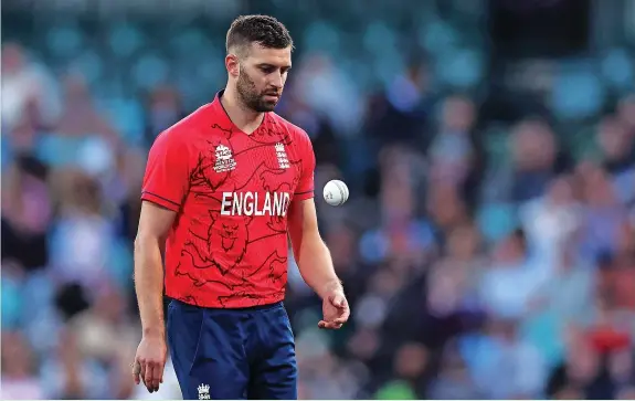  ?? Cameron Spencer ?? >
England’s Mark Wood is facing a race against time to be fit for the T20 World Cup semi-final clash with India tomorrow morning