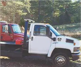  ?? Contribute­d photo ?? Tow trucks of all kinds and their operators would fall under a new ordinance being put together by the Polk County Commission controllin­g several areas of concern, ranging from the safety and licensing regulation­s put on wrecker services, to how much...