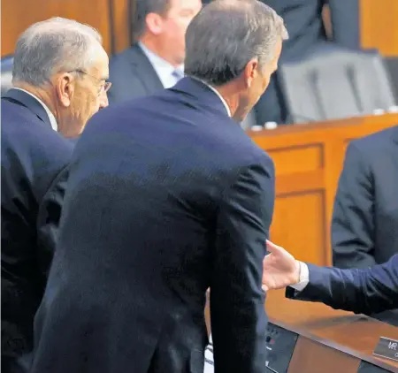  ??  ?? Republican lawmakers (from left) Chuck Grassley and John Thune took the opportunit­y to talk with Mark Zuckerberg