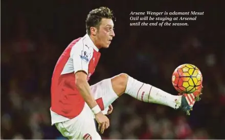  ??  ?? Arsene Wenger is adamant Mesut Ozil will be staying at Arsenal until the end of the season.