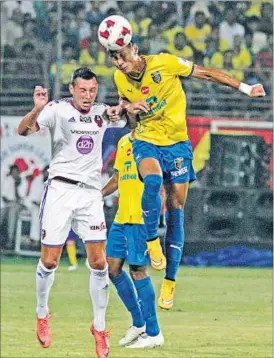  ??  ?? Kerala Blasters and FC Goa players vie for the ball during the match on Thursday.