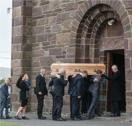  ?? PHOTO: MARK CONDREN ?? Courage: The coffin of Emma Mhic Mhathúna is followed by her children Natasha, Donnacha, Seamus, Mario and Oisín.