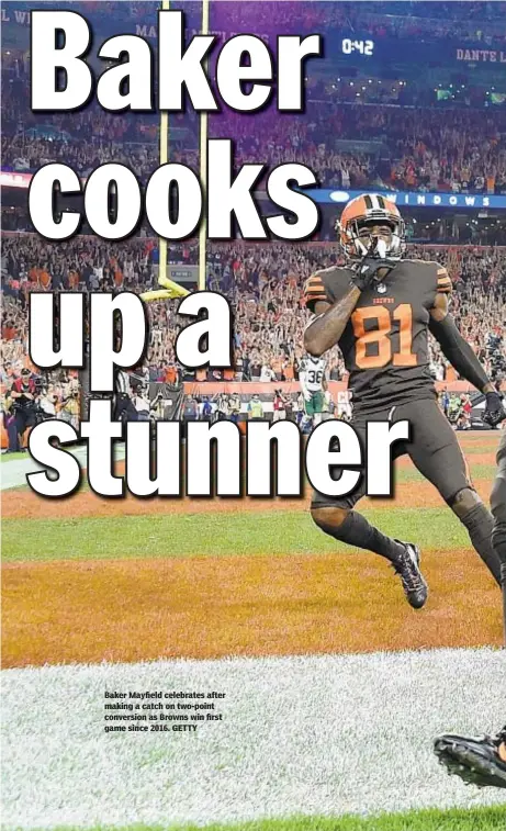  ??  ?? Baker Mayfield celebrates after making a catch on two-point conversion as Browns win first game since 2016. GETTY