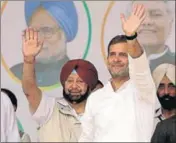  ?? SANJEEV KUMAR/HT ?? Congress chief Rahul Gandhi and Punjab CM Capt Amarinder Singh waving to the crowd during a rally in support of party candidate Mohammad Sadique in Bargari on Wednesday.