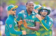  ?? AP ?? Kagiso Rabada (C) and Tabraiz Shamsi (R) starred for SA.