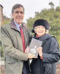  ??  ?? Dorothy Bentley Smith with Macclesfie­ld MP David Rutley and her latest book