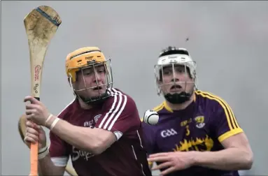  ??  ?? Full-back Liam Ryan keeps a close eye on Galway attacker Davy Glennon.