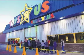  ?? ADOLPHE PIERRE-LOUIS/JOURNAL ?? This file photo shows customers lined up at the Toys “R” Us store that used to be at Winrock mall. The company shut down all of its U.S. stores last year.