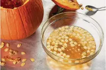  ?? Rey Lopez/For The Washington Post ?? Put pumpkin and other gourd seeds to the water test: Good seeds will float to the top.