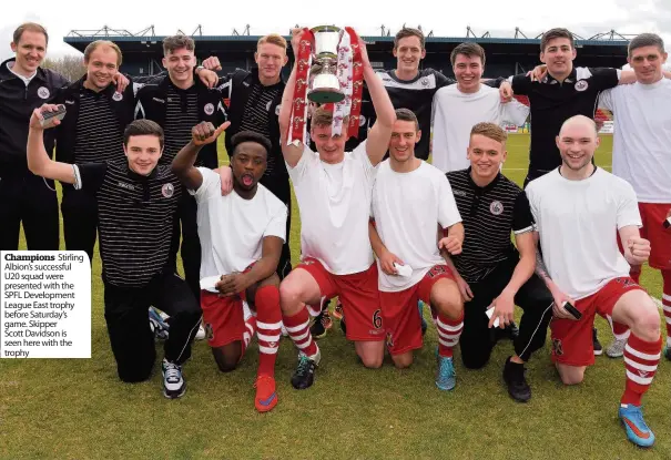  ??  ?? Champions Stirling Albion’s successful U20 squad were presented with the SPFL Developmen­t League East trophy before Saturday’s game. Skipper Scott Davidson is seen here with the trophy
Leaving
