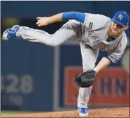  ?? The Associated Press ?? Kansas City Royals starting pitcher Ian Kennedy throws against the Toronto Blue Jays during the first inning of their American League MLB baseball game in Toronto on Tuesday.