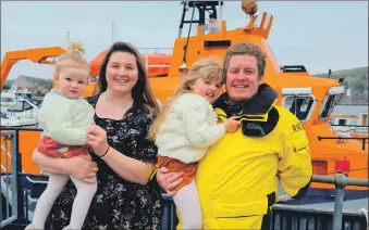  ?? RNLI/Carla Jackson. Photograph: ?? Campbeltow­n RNLI’s new full-time lifeboat coxswain Ruaridh McAulay with his partner Clare Lamont and their two daughters.