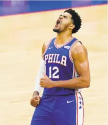  ?? Matt Slocum / Associated Press ?? Philadelph­ia’s Tobias Harris is revved up as the topseeded 76ers eliminated Washington in five games.